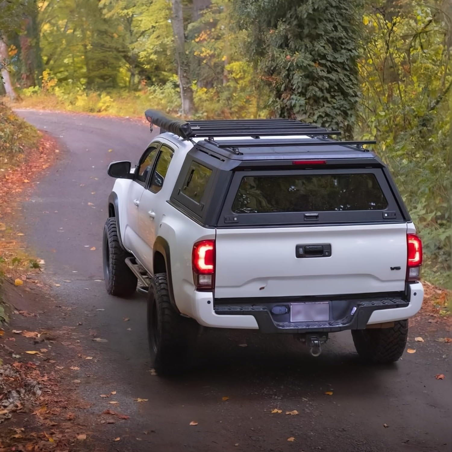 Hynex hard truck topper worth buying,Hynex hard truck topper pros cons,best hard truck topper for Chevy Colorado,should I buy a Hynex truck canopy,Hynex topper vs other brands,hard truck bed cap for Colorado performance testing and real-world results