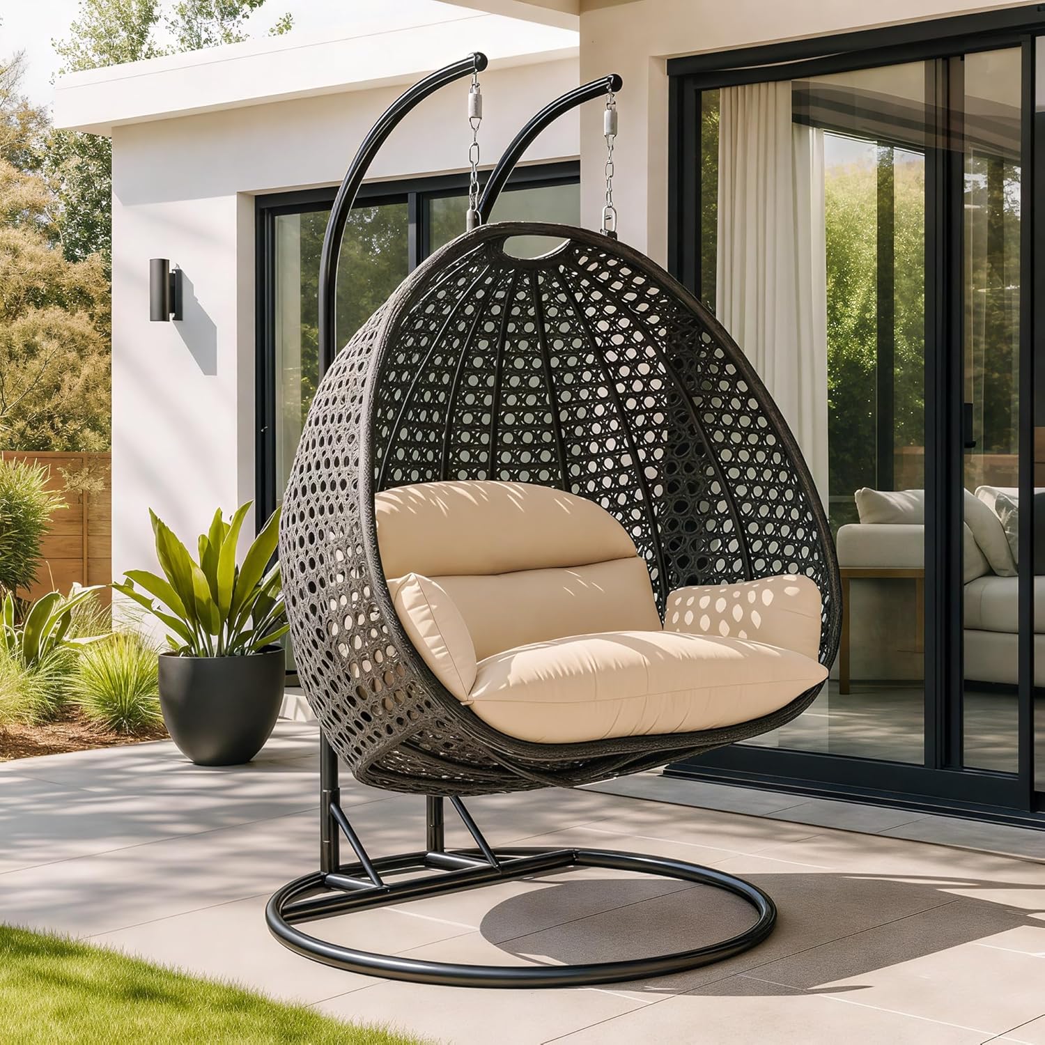 LeisureMod 2 person hanging egg chair worth buying,best outdoor swing chair for two,LeisureMod egg chair pros cons,hanging egg chair for porch vs alternatives,can two people sit in hanging egg chair,heavy duty egg chair with stand performance testing and real-world results
